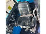 a seat in the back of a bus with a seat belt on it