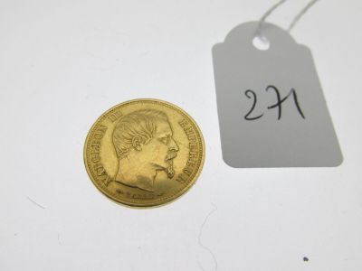 une image représentant une pièce d'or sur laquelle figure une étiquette de prix