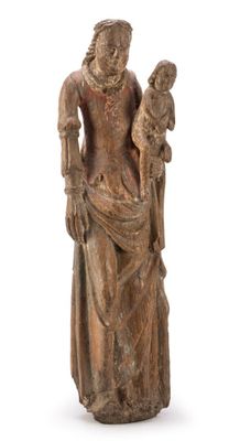 statue of a woman holding a bird and a bird on her arm