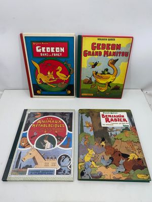 trois livres pour enfants sont posés sur une table blanche
