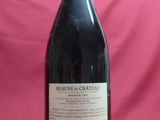 a bottle of wine that is sitting on a table