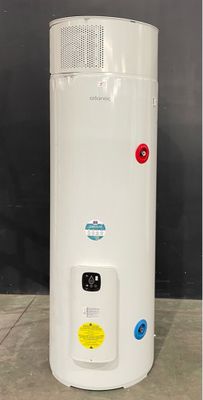 a white water heater sitting on top of a cement floor