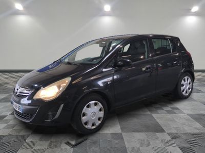 a picture of a black car parked in a garage
