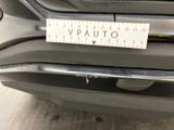 a close up of a car with a measuring tape on it ' s bumper