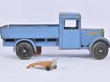 a blue toy truck with a cat on the back