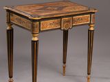 an image of a small table with a drawer on top of it