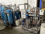 an image of a room filled with lots of different types of water