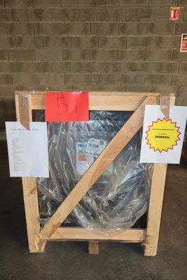a pallet with a plastic bag on it in a warehouse