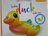 an inflatable duck toy in the box