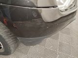 a close up of a car ' s front bumper