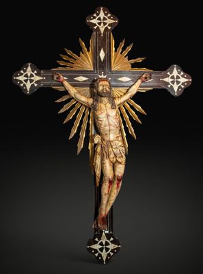 une image représentant une statue de Jésus sur une croix, sur fond noir