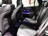 a picture of the inside of a car with the front seats down