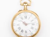 Montre de poche avec chiffres romains et chiffres romains sur le cadran