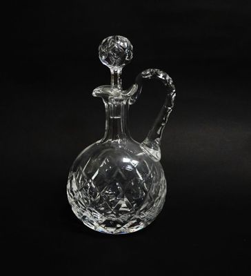 crystal decanter on a black background with a black background