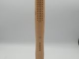 a hammer with a wooden handle sitting on top of a white surface