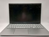 an open laptop computer sitting on top of a white table