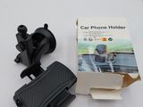 a car phone holder that is sitting on top of a table