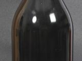 a bottle of wine sitting next to a bottle of wine