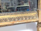 a mirror that is sitting on a table