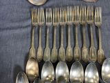 a lot of spoons and spoon spoons on the table