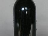 a bottle of wine that is sitting on a table