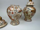 three vases that are sitting next to each other on a table