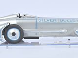 a silver model of a car with a red star on the side