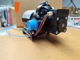 a motor that is connected to a box on a table