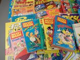 a lot of comics on the table together
