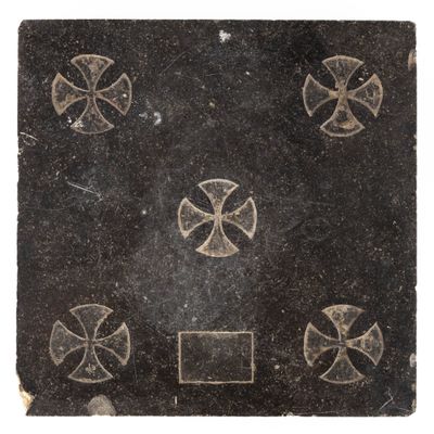 an image of a black tile with crosses on it