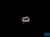 a square cut aquamarinee gems on a black background