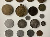 a lot of old coins on the table