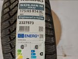 a close up of a tire with a sticker on it