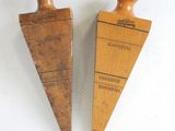 pair of vintage wooden bookends on a white background