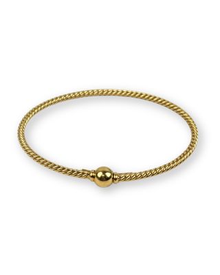 un bracelet plaqué or muni d'un fermoir à boule