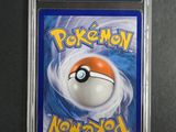 a close up of a card in a plastic case on a table