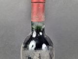 a bottle of wine that is sitting on a table