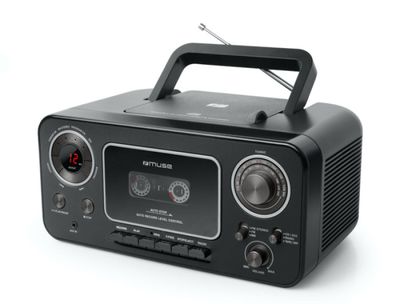 une image représentant une radio noire posée sur une surface blanche
