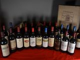 a lot of bottles of wine on a table