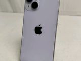 an apple iphone 11 is sitting on a table with a white background