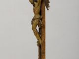a statue of jesus on a cross on a table