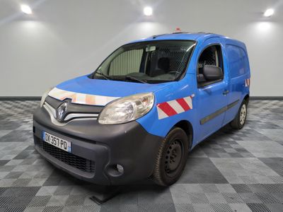 the blue van is parked on a checkered floor in the garage