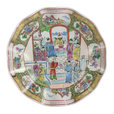 a plate with a picture of people on it