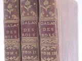 three books that are sitting on top of each other