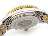 rolex watch on a white background with a yellow band
