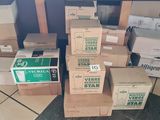 many boxes stacked on top of each other on the floor