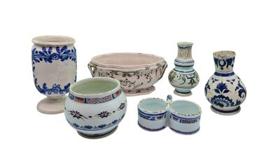 a group of vases that are sitting on a table