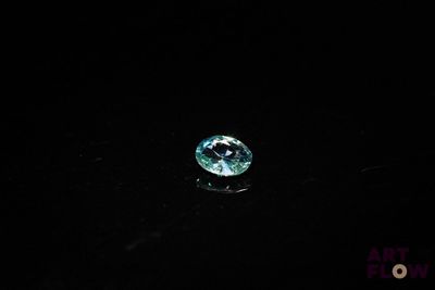 a blue diamond in the dark