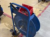 two carts that are sitting on the floor in a warehouse