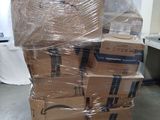 a large stack of boxes sitting on top of a pallet